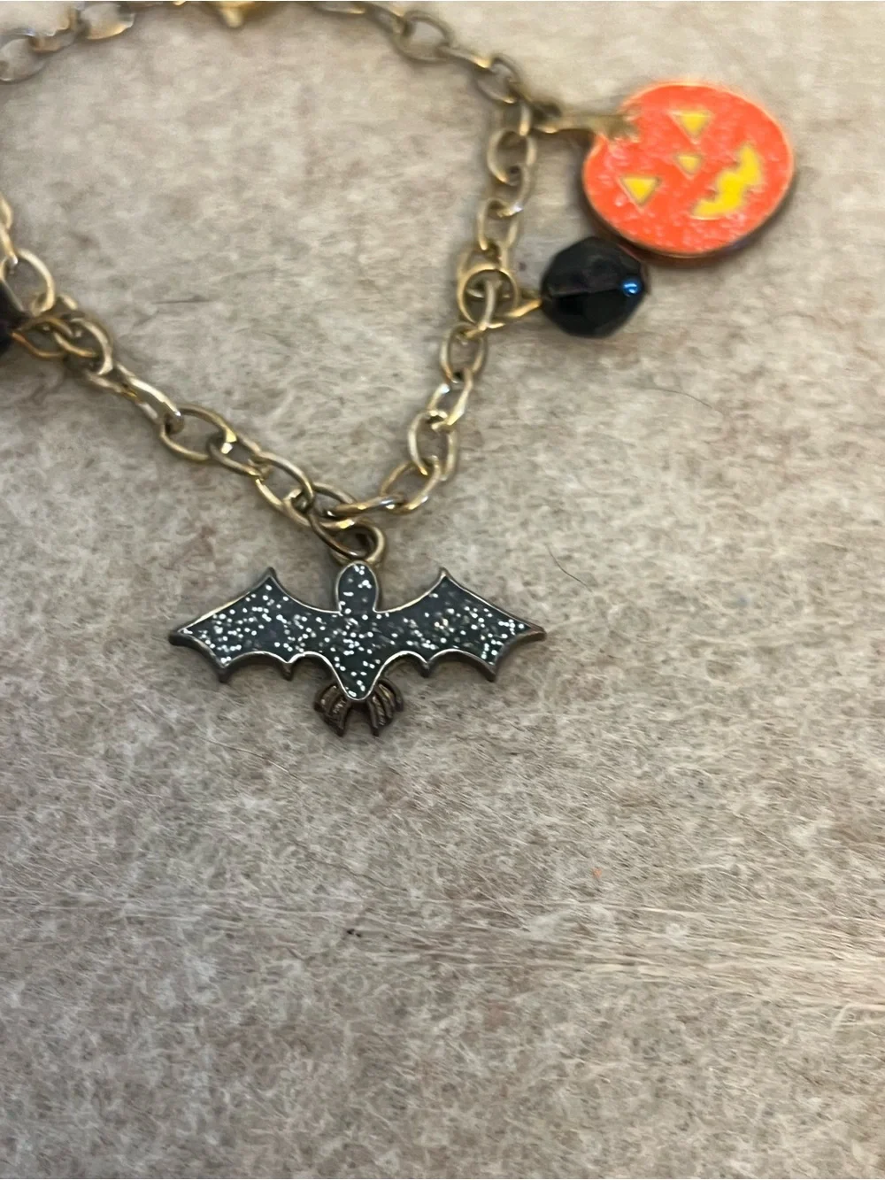 Adorable Halloween charm bracelet! With pumpkin, candy corn, and bat charms